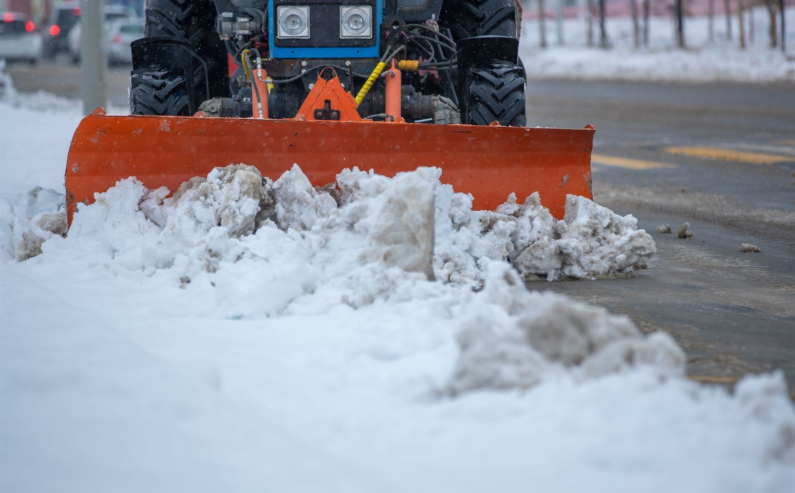 Snow cleared from a residential driveway after a winter storm — snow removal in Charlottesville, VA